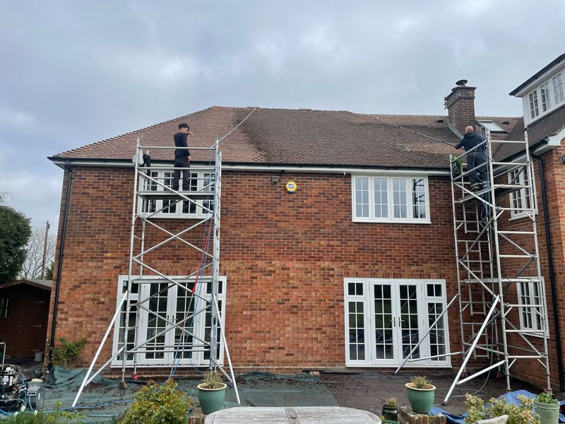Roof cleaning carried out safely from scaffold towers by The Roof Moss Cleaners in Wellesbourne